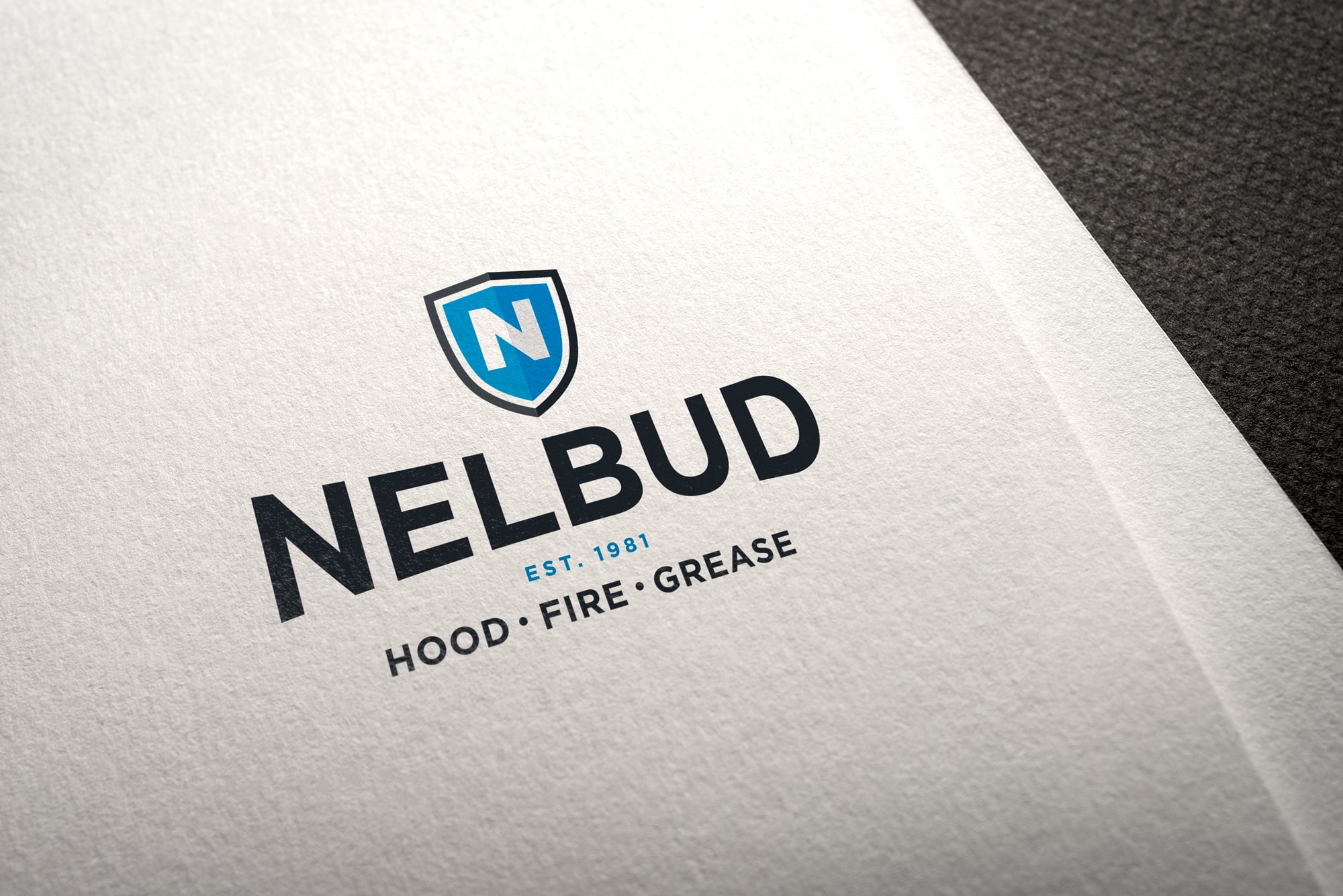 nelbud-logo-on-paper